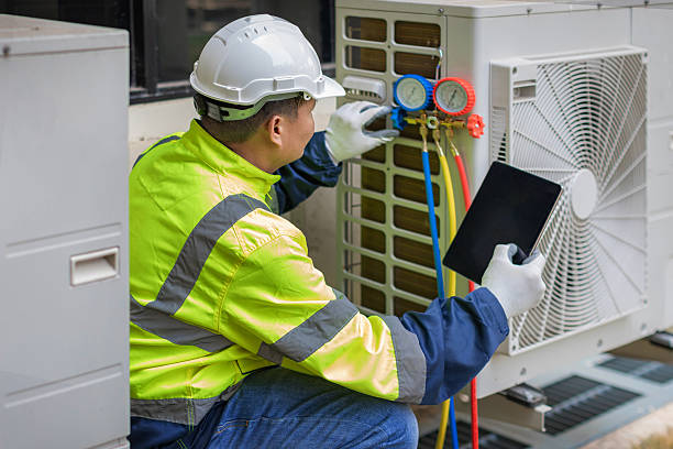 Professional Hvac technician working in Clanton, AL